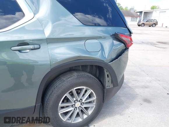 2023 Chevrolet Traverse LT Cloth z VIN 1GNERGKW6PJ110388, wystawiony jako IAAI lot #41922769 z przebiegiem 59 186 mil mil oraz . Historia ofert i sprzedaży dostępna na DreamBid. Obrazek 6.