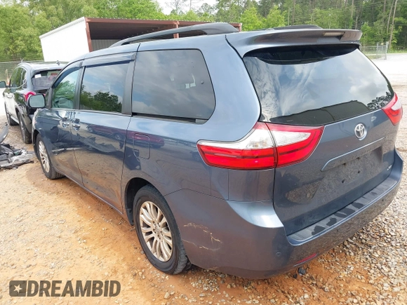 2015 Toyota Sienna XLE with VIN 5TDYK3DC1FS594123, listed as a IAAI auction lot 41944711 with 208,249 mi miles. Bid and sale history available at carsss.com. Image 3.