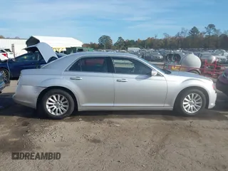 2012 Chrysler 300 with VIN 2C3CCAAG6CH104745, listed as a IAAI auction lot 40708856 with 125,186 mi miles. Bid and sale history available at carsss.com. Image 13.