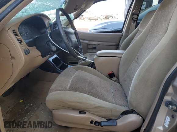 1998 Ford Explorer XL z VIN 1FMZU34E4WUA14628, wystawiony jako Copart lot #47477325 z przebiegiem 88 954 mil mil oraz Szkoda całkowita • Salvage title. Historia ofert i sprzedaży dostępna na DreamBid. Obrazek 7.