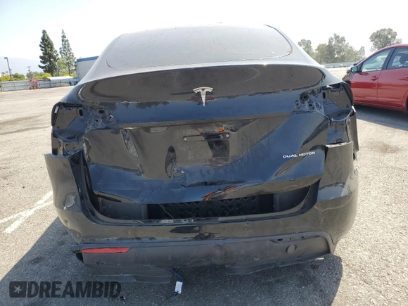 2024 Tesla Model Y Long Range with VIN 7SAYGDEE6RA219456, listed as a Copart auction lot 61855165 with 29,869 mi miles and Salvage title. Bid and sale history available at DreamBid. Image 6.