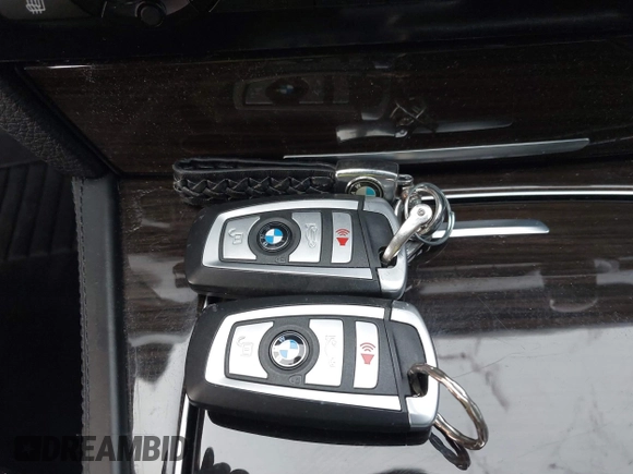 2015 BMW 7 Series 750i xDrive with VIN WBAYB6C56FG299238, listed as a IAAI auction lot 41441393 with 62,396 mi miles. Bid and sale history available at carsss.com. Image 11.