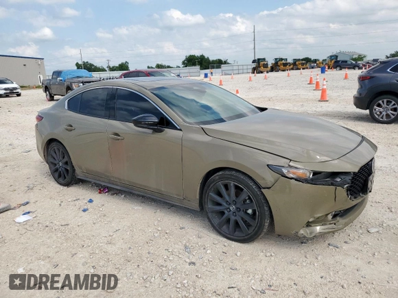 2024 Mazda 3 Carbon Edition with VIN 3MZBPBXYXRM409075, listed as a Copart auction lot 59189265 with 23,114 mi miles and Salvage title. Bid and sale history available at DreamBid. Image 4.