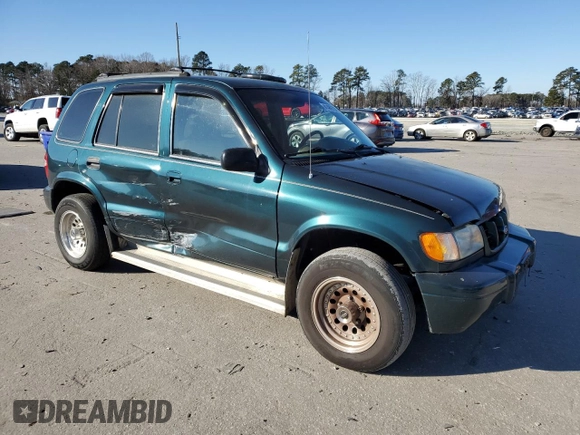 2001 Kia Sportage with VIN KNDJB723115705926, listed as a Copart auction lot 41489735 with 155,820 mi miles and Salvage Title. Bid and sale history available at carsss.com. Image 4.