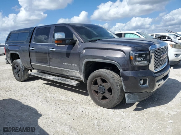 2015 GMC Sierra 2500HD Denali with VIN 1GT120EG3FF663024, listed as a Copart auction lot 79042604 with 189,284 mi miles and Salvage Title. Bid and sale history available at carsss.com. Image 4.