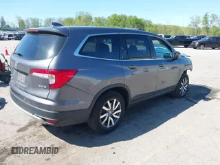 2020 Honda Pilot EX-L z VIN 5FNYF6H58LB049652, wystawiony jako IAAI lot #42213555 z przebiegiem 84 846 mil mil oraz . Historia ofert i sprzedaży dostępna na DreamBid. Obrazek 4.