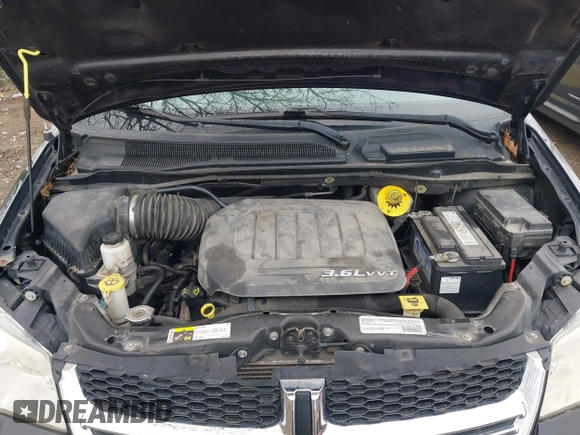 2015 Dodge Grand Caravan American Value with VIN 2C4RDGBG5FR512267, listed as a IAAI auction lot 41923200 with 154,234 mi miles and . Bid and sale history available at DreamBid. Image 10.