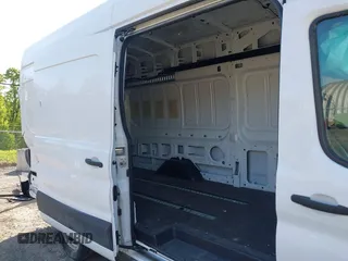 2021 Ford Transit Cargo z VIN 1FTBW3X84MKA60720, wystawiony jako IAAI lot #42202665 z przebiegiem 67 295 mil mil oraz . Historia ofert i sprzedaży dostępna na DreamBid. Obrazek 8.