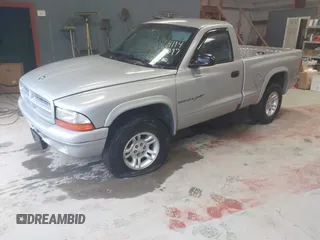2001 Dodge Dakota with VIN 1B7GG26X21S118759, listed as a IAAI auction lot 41943297 with 156,372 mi miles and . Bid and sale history available at carsss.com. Image 17.