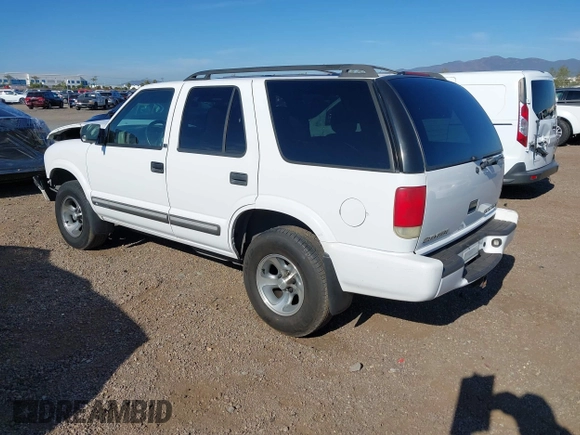 2001 Chevrolet Blazer LT z VIN 1GNCS13W712122865, wystawiony jako IAAI lot #41997035 z przebiegiem 161 862 mil mil oraz . Historia ofert i sprzedaży dostępna na DreamBid. Obrazek 3.