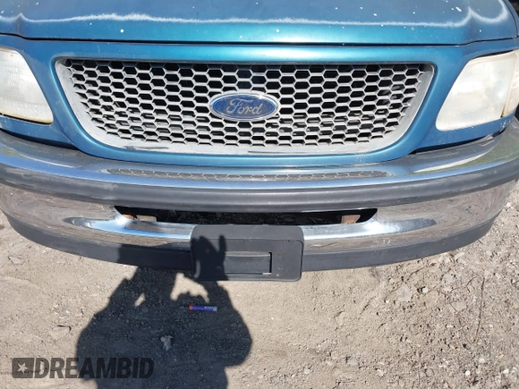 2000 Ford F-150 XL with VIN 1FTRX17L5YNC02971, listed as a IAAI auction lot 42041309 with Not provided miles and . Bid and sale history available at DreamBid. Image 6.