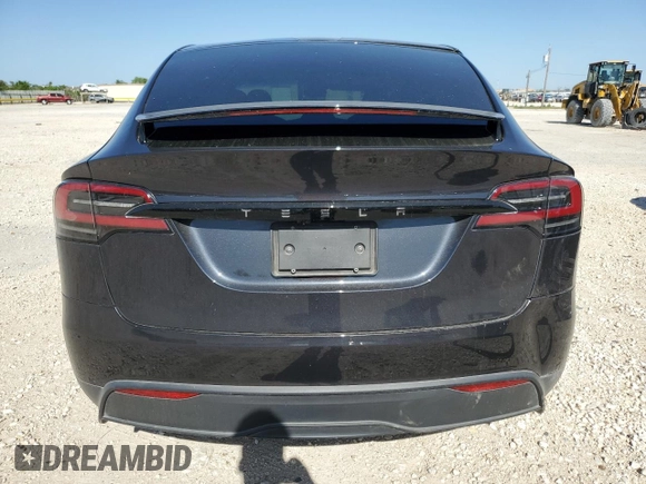 2023 Tesla Model X with VIN 7SAXCDE5XPF422163, listed as a Copart auction lot 52573185 with Not Provided miles and Salvage Title. Bid and sale history available at DreamBid. Image 6.