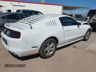 2014 Ford Mustang V6 with VIN 1ZVBP8AM0E5268865, listed as a IAAI auction lot 41884812 with 128,977 mi miles. Bid and sale history available at carsss.com. Image 4.