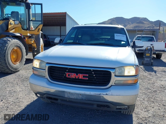 2002 GMC Yukon SLT z VIN 1GKEC13T32R256757, wystawiony jako IAAI lot #41657945 z przebiegiem 331 831 mil mil oraz . Historia ofert i sprzedaży dostępna na DreamBid. Obrazek 6.