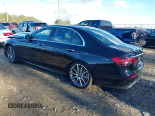 2021 Mercedes-Benz E-Class E 450 with VIN W1KZF5KB8MB002449, listed as a IAAI auction lot 41224307 with 57,093 mi miles. Bid and sale history available at carsss.com. Image 3.