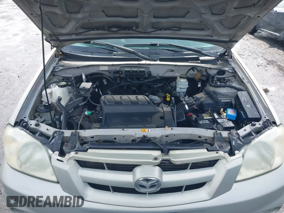 2006 Mazda Tribute S with VIN 4F2YZ04136KM15337, listed as a IAAI auction lot 41689177 with 153,720 mi miles and . Bid and sale history available at DreamBid. Image 10.