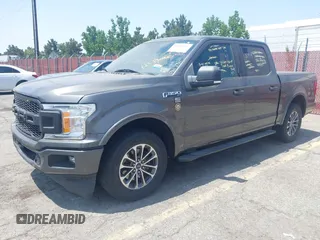 2018 Ford F-150 XL with VIN 1FTEW1CPXJKD56562, listed as a IAAI auction lot 42588371 with 137,496 mi miles and . Bid and sale history available at DreamBid. Image 2.