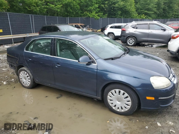 2005 Volkswagen Jetta 2.5L with VIN 3VWRG71K45M628981, listed as a Copart auction lot 58531595 with 128,217 mi miles and Salvage title. Bid and sale history available at DreamBid. Image 4.