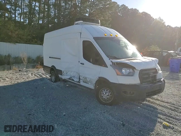 2020 Ford Transit Cargo with VIN 1FTBF4XG3LKB70573, listed as a Copart auction lot 77039474 with 131,873 mi miles and Salvage Title. Bid and sale history available at DreamBid. Image 12.