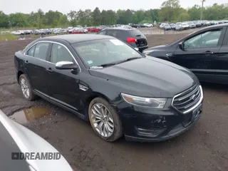 2014 Ford Taurus Limited z VIN 1FAHP2J8XEG112310, wystawiony jako IAAI lot #42367397 z przebiegiem 77 329 mil mil oraz . Historia ofert i sprzedaży dostępna na DreamBid. Obrazek 13.
