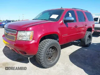 2007 Chevrolet Tahoe LT with VIN 1GNFC13037R231409, listed as a IAAI auction lot 42303972 with 82,550 mi miles and . Bid and sale history available at DreamBid. Image 2.
