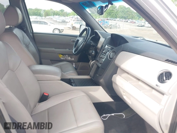 2015 Honda Pilot EX-L with VIN 5FNYF4H5XFB014653, listed as a IAAI auction lot 42121003 with 152,912 mi miles and . Bid and sale history available at carsss.com. Image 5.