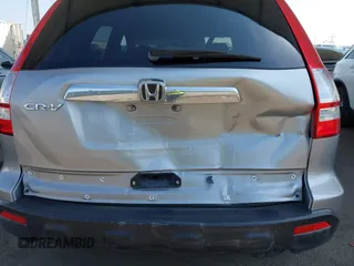 2007 Honda CR-V EX with VIN JHLRE38557C069515, listed as a IAAI auction lot 42121504 with 153,971 mi miles and . Bid and sale history available at carsss.com. Image 6.