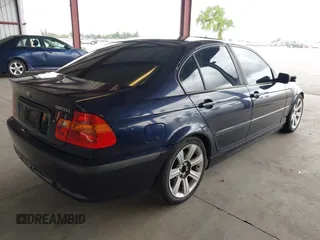 2002 BMW 3 Series 325i with VIN WBAET37412NG79855, listed as a IAAI auction lot 41916316 with 232,702 mi miles. Bid and sale history available at carsss.com. Image 4.