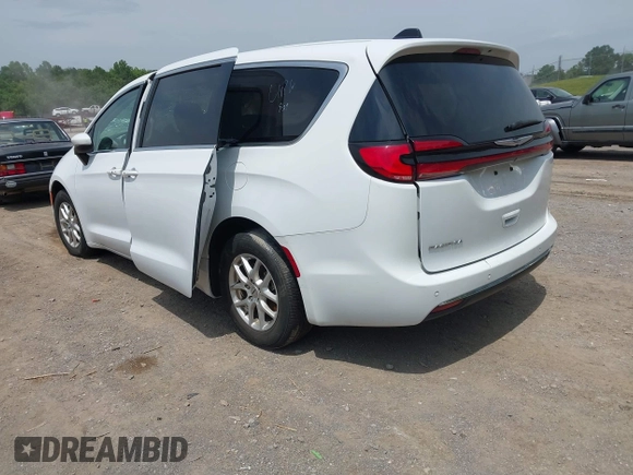2023 Chrysler Pacifica Touring L with VIN 2C4RC1BGXPR531396, listed as a IAAI auction lot 42492340 with Not provided miles and . Bid and sale history available at DreamBid. Image 3.