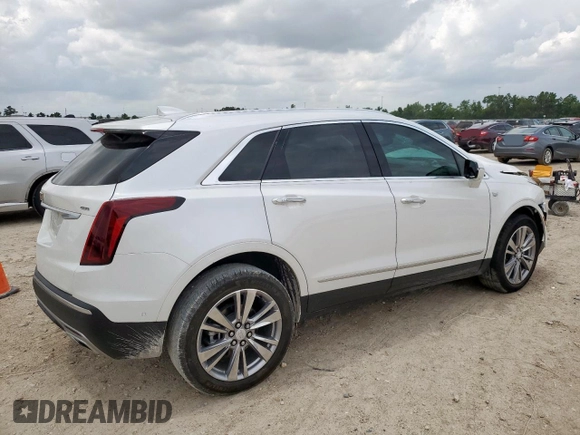 2024 Cadillac XT5 FWD Premium Luxury with VIN 1GYKNCRS9RZ706158, listed as a Copart auction lot 60455055 with 7,999 mi miles and Salvage title. Bid and sale history available at DreamBid. Image 3.