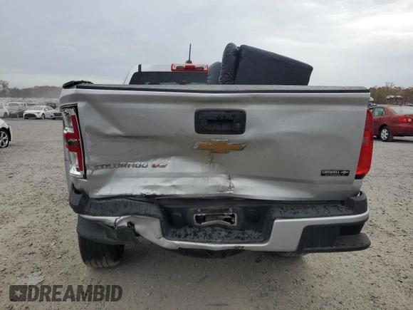 2020 Chevrolet Colorado 2WD Work Truck with VIN 1GCHSBEN7L1143846, listed as a Copart auction lot 78406494 with 76,582 mi miles and Salvage title. Bid and sale history available at DreamBid. Image 6.