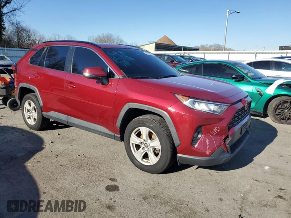 2019 Toyota RAV4 XLE with VIN JTMP1RFV2KD039171, listed as a Copart auction lot 82153374 with 64,482 mi miles and Salvage Title. Bid and sale history available at carsss.com. Image 4.
