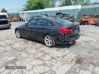 2015 BMW 4 Series 428i xDrive with VIN WBA4C9C52FD331620, listed as a IAAI auction lot 42556526 with 115,674 mi miles and . Bid and sale history available at DreamBid. Image 3.