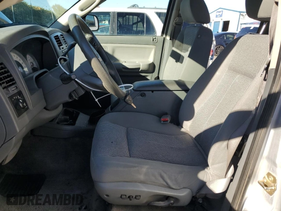 2007 Dodge Dakota SLT with VIN 1D7HE48K47S103248, listed as a Copart auction lot 82744094 with 126,126 mi miles and Salvage Title. Bid and sale history available at DreamBid. Image 7.