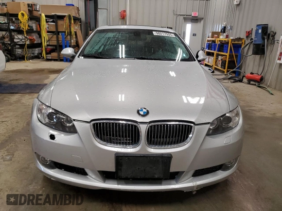 2009 BMW 3 Series 335i xDrive with VIN WBAWC735X9E270335, listed as a Copart auction lot 50217555 with 119,339 mi miles and Clean Title. Bid and sale history available at carsss.com. Image 5.