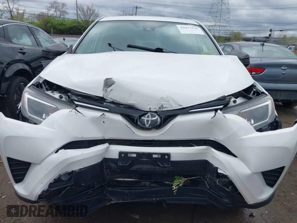 2018 Toyota RAV4 LE with VIN 2T3BFREVXJW793174, listed as a IAAI auction lot 42037936 with 82,304 mi miles. Bid and sale history available at carsss.com. Image 12.