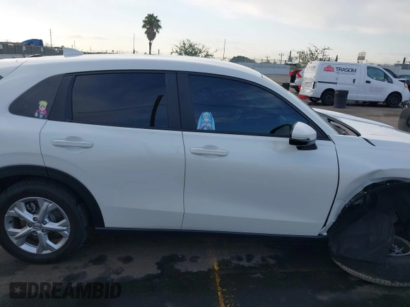 2023 Honda HR-V LX with VIN 3CZRZ1H32PM739454, listed as a IAAI auction lot 41444520 with 16,696 mi miles and . Bid and sale history available at DreamBid. Image 13.