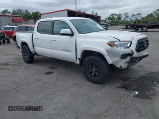2021 Toyota Tacoma 4WD SR with VIN 3TMCZ5AN4MM428599, listed as a IAAI auction lot 41335056 with 72,649 mi miles. Bid and sale history available at carsss.com. Image 1.