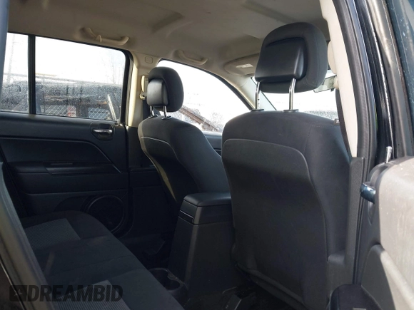 2015 Jeep Compass Sport with VIN 1C4NJDBBXFD114579, listed as a IAAI auction lot 41911501 with 95,732 mi miles and . Bid and sale history available at carsss.com. Image 8.