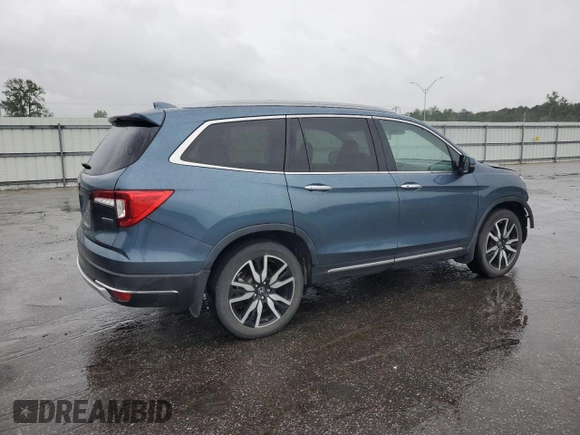 2022 Honda Pilot Touring 7-Passenger z VIN 5FNYF5H63NB015091, wystawiony jako Copart lot #56323725 z przebiegiem 28 614 mil mil oraz Szkoda całkowita • Salvage title. Historia ofert i sprzedaży dostępna na DreamBid. Obrazek 3.