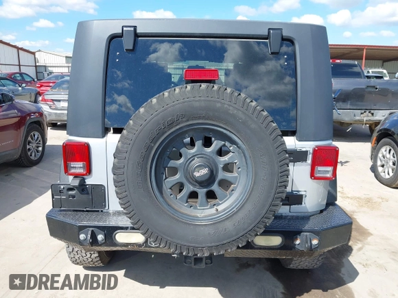 2008 Jeep Wrangler Unlimited Rubicon with VIN 1J4GA69178L550598, listed as a IAAI auction lot 42232887 with 99,637 mi miles and . Bid and sale history available at carsss.com. Image 16.