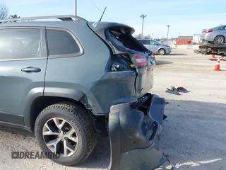 2014 Jeep Cherokee Trailhawk z VIN 1C4PJMBS5EW147579, wystawiony jako IAAI lot #41781543 z przebiegiem 155 751 mil mil oraz . Historia ofert i sprzedaży dostępna na DreamBid. Obrazek 19.