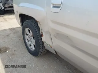 2007 Honda Ridgeline RTL z VIN 2HJYK16517H530890, wystawiony jako IAAI lot #42521976 z przebiegiem 285 222 mil mil oraz . Historia ofert i sprzedaży dostępna na DreamBid. Obrazek 6.