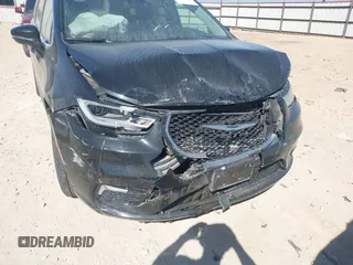 2023 Chrysler Pacifica Hybrid Touring L with VIN 2C4RC1L75PR611901, listed as a IAAI auction lot 41510935 with 44,156 mi miles and . Bid and sale history available at DreamBid. Image 6.