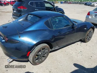 2021 Mazda MX-5 Miata Grand Touring with VIN JM1NDAM7XM0455743, listed as a IAAI auction lot 42067373 with 28,255 mi miles and . Bid and sale history available at DreamBid. Image 6.