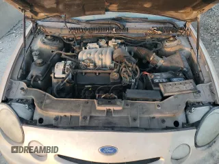 1997 Ford Taurus GL z VIN 1FALP52U9VG142664, wystawiony jako Copart lot #84054224 z przebiegiem 151 610 mil mil oraz Czysty tytuł • Clean title. Historia ofert i sprzedaży dostępna na DreamBid. Obrazek 11.