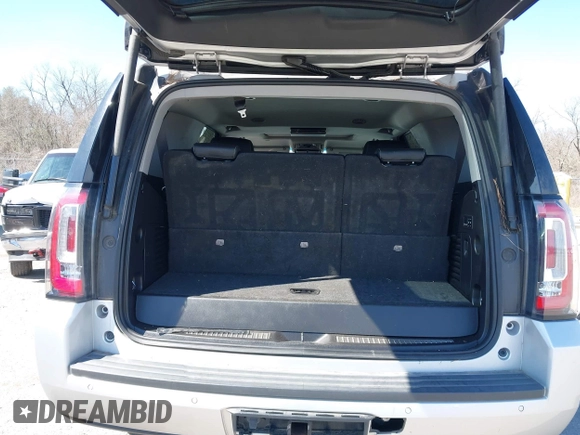 2019 GMC Yukon SLT with VIN 1GKS1BKC5KR277478, listed as a IAAI auction lot 41632624 with 86,770 mi miles. Bid and sale history available at carsss.com. Image 8.