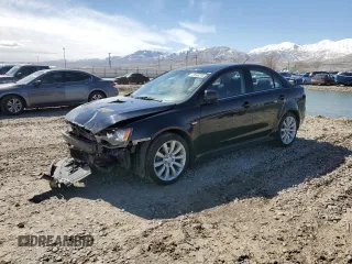 2010 Mitsubishi Lancer Ralliart z VIN JA32V6FV2AU032361, wystawiony jako Copart lot #49596265 z przebiegiem 122 994 mil mil oraz Szkoda całkowita • Salvage title. Historia ofert i sprzedaży dostępna na DreamBid. Obrazek 1.