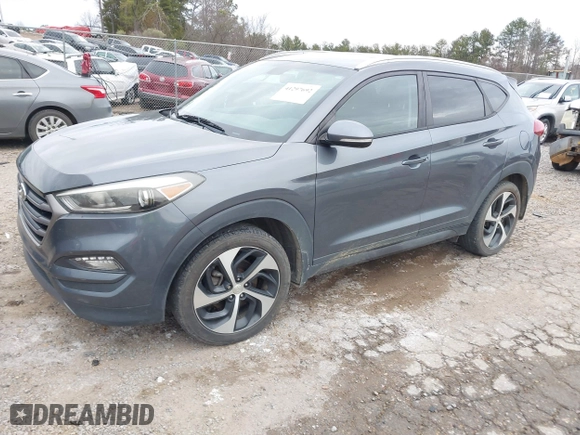 2016 Hyundai Tucson Sport with VIN KM8J33A21GU254828, listed as a IAAI auction lot 41297692 with 134,394 mi miles. Bid and sale history available at carsss.com. Image 17.