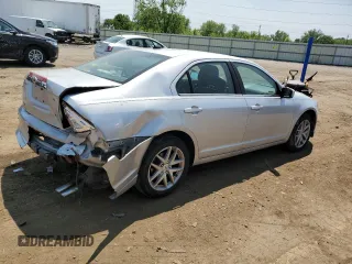 2012 Ford Fusion SEL z VIN 3FAHP0JA0CR282897, wystawiony jako Copart lot #58813155 z przebiegiem 170 464 mil mil oraz Czysty tytuł • Clean title. Historia ofert i sprzedaży dostępna na DreamBid. Obrazek 3.
